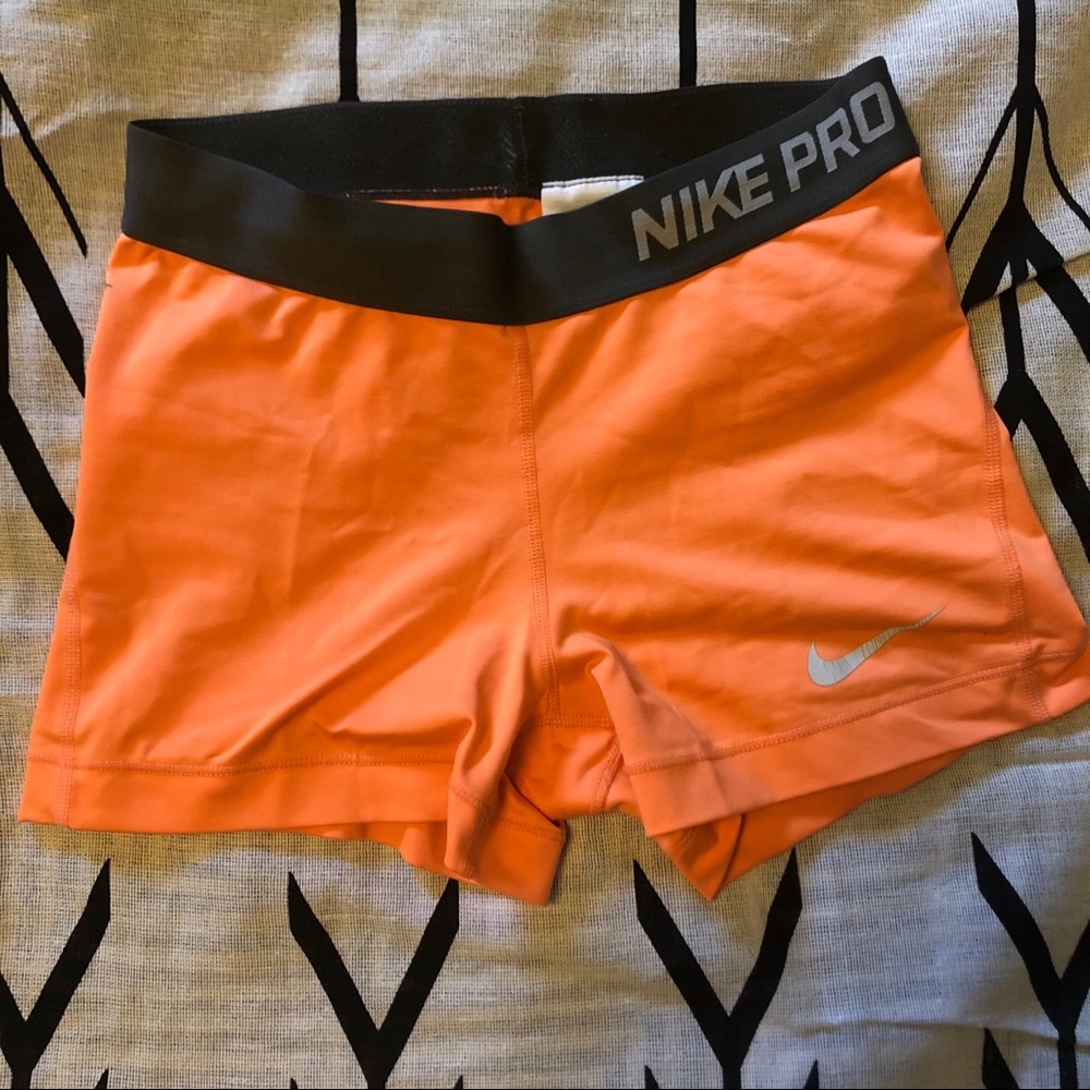 Bright orange Nike Pro Spandex